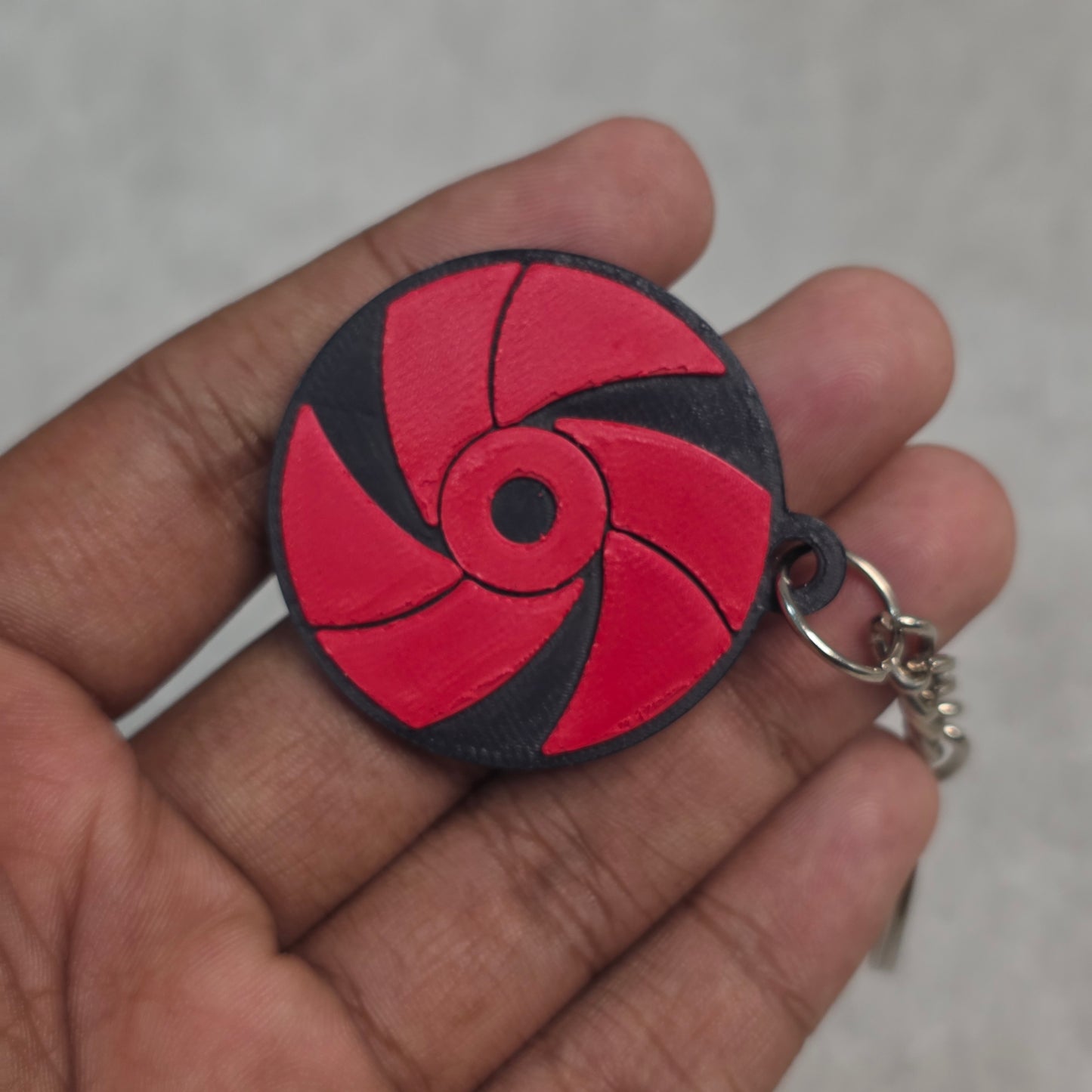 Rai Uchiha Mangekyou Sharingan Keychain | Two Tone Naruto Keyring