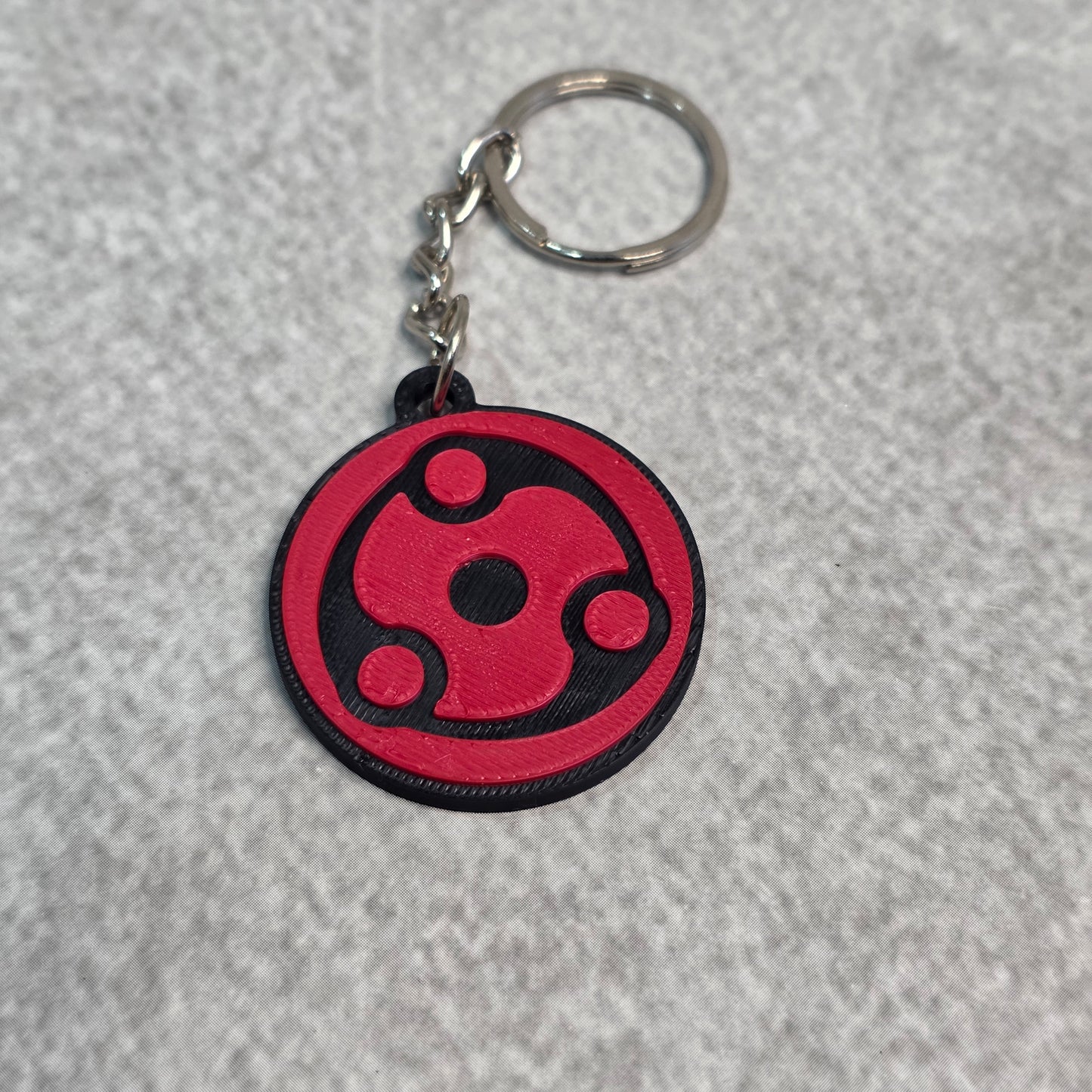 Madara Uchiha Mangekyou Sharingan Keychain | Two Tone Naruto Keyring