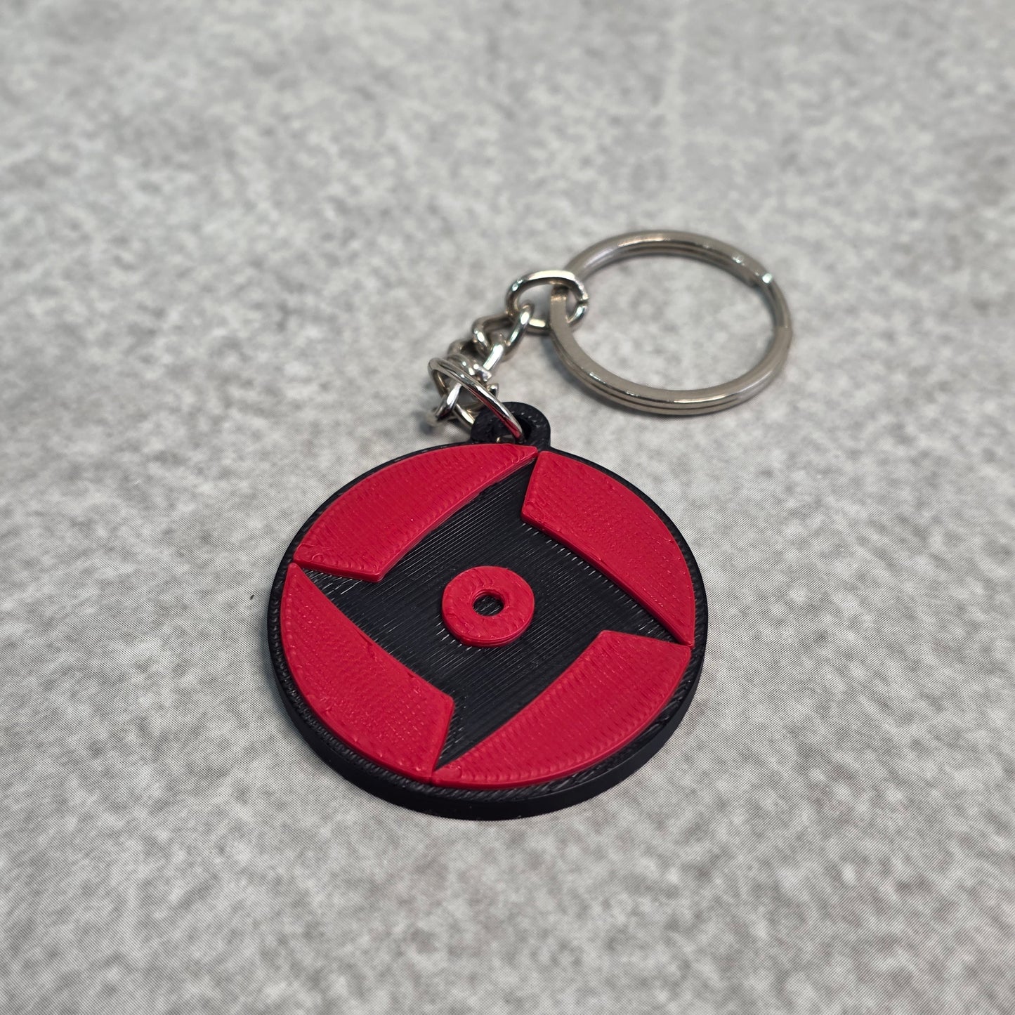 Shisui Uchiha Mangekyou Sharingan Keychain | Two Tone Naruto Keyring