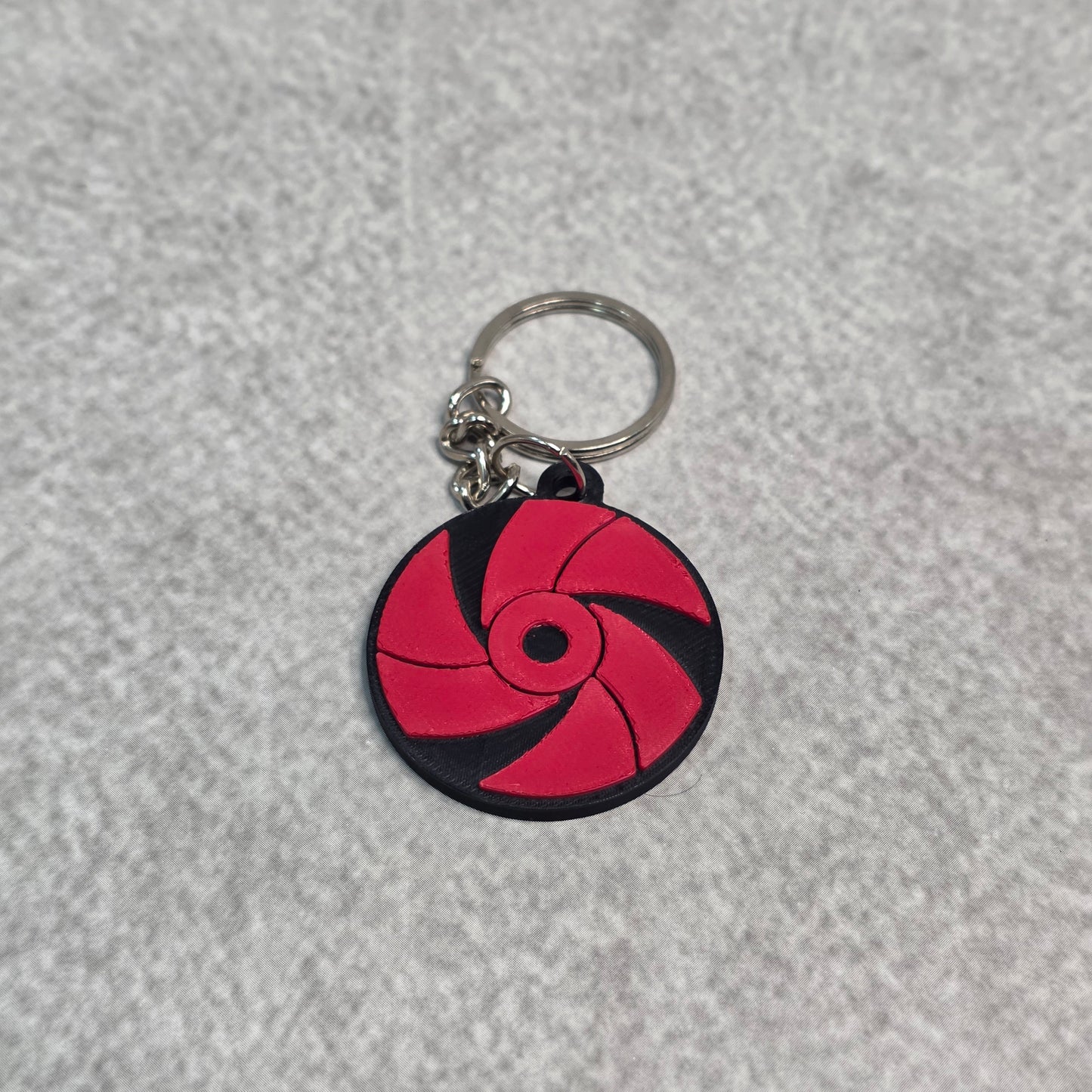 Rai Uchiha Mangekyou Sharingan Keychain | Two Tone Naruto Keyring