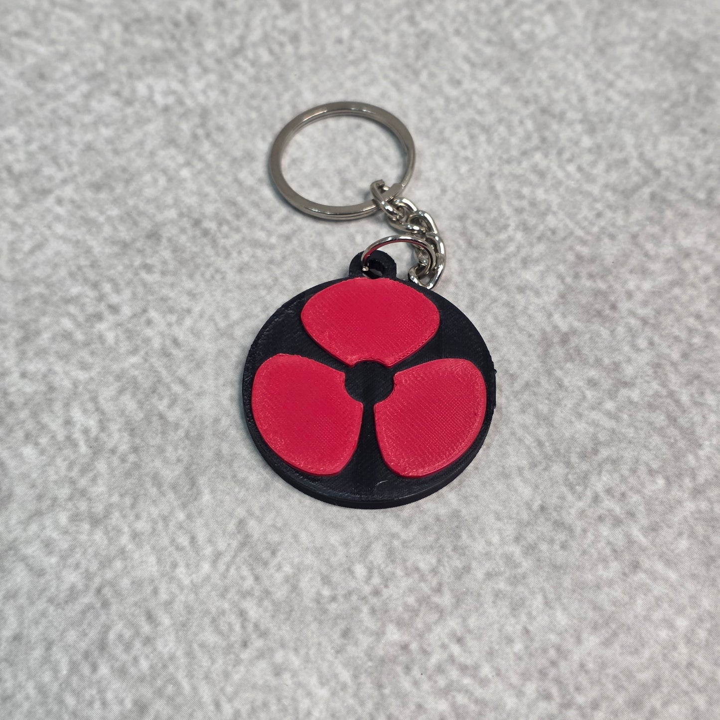 Naori Uchiha Mangekyou Sharingan Keychain | Two Tone Naruto Keyring