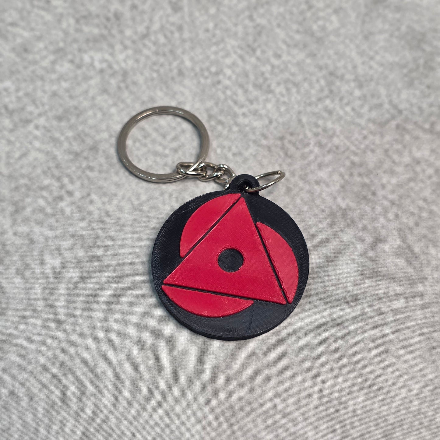 Baru Uchiha Mangekyou Sharingan Keychain | Two Tone Naruto Keyring